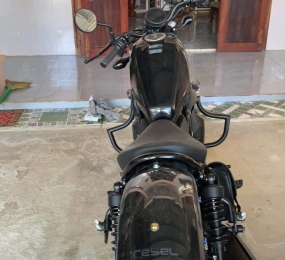 Chống đổ cánh bướm rebel 300/500